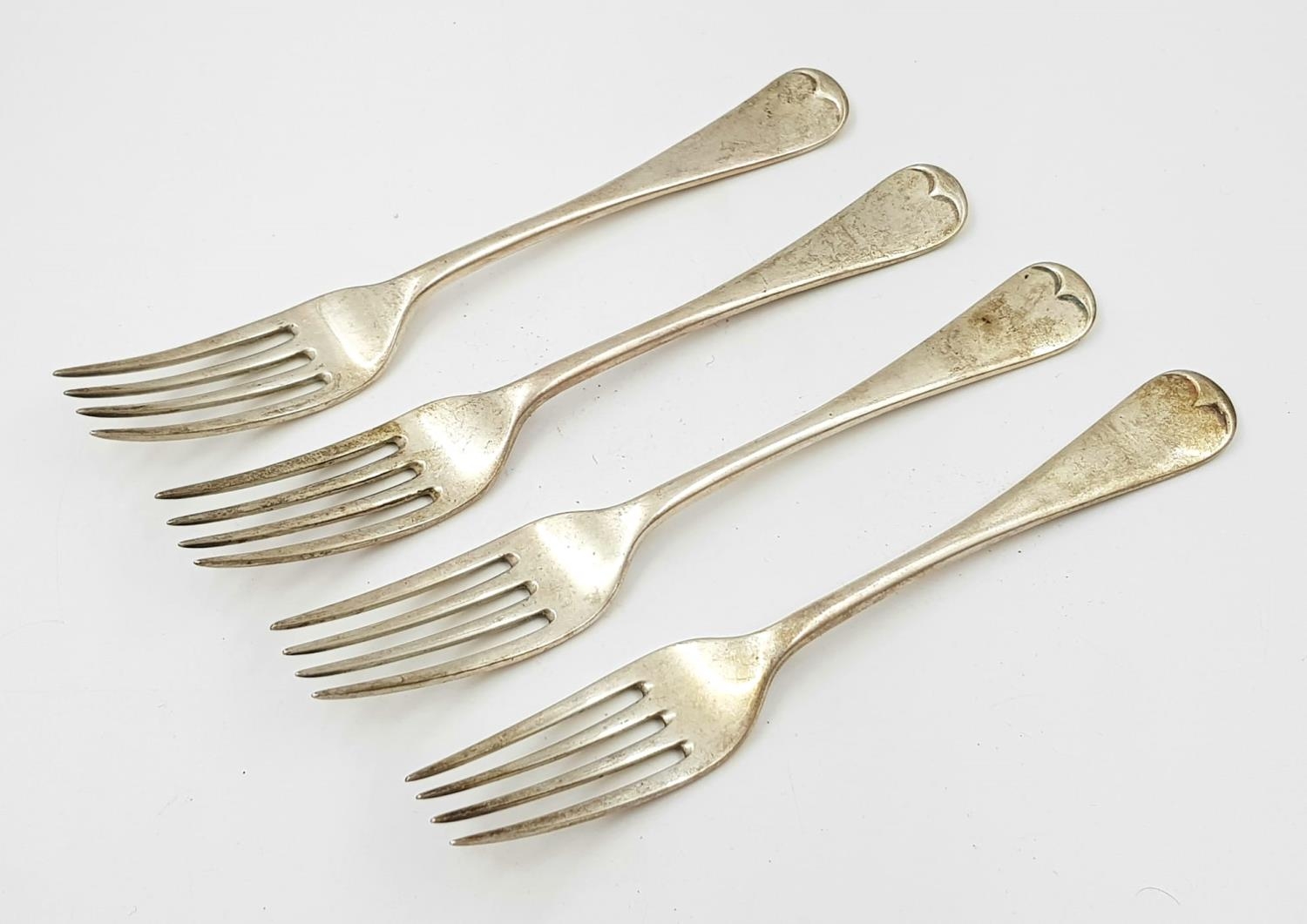 Four Antique William Hutton and Sons of London Sterling Silver Forks. 190g total weight.