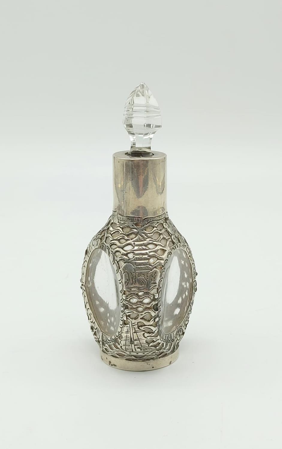 An Antique Chinese Sterling Silver Bottle with Crystal Glass Topper. Pierced Dragon and Flower - Image 3 of 6