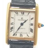 A Vintage 18K Yellow Gold Collingwood Tank Watch. Black leather strap with gold case - 23mm. Lug