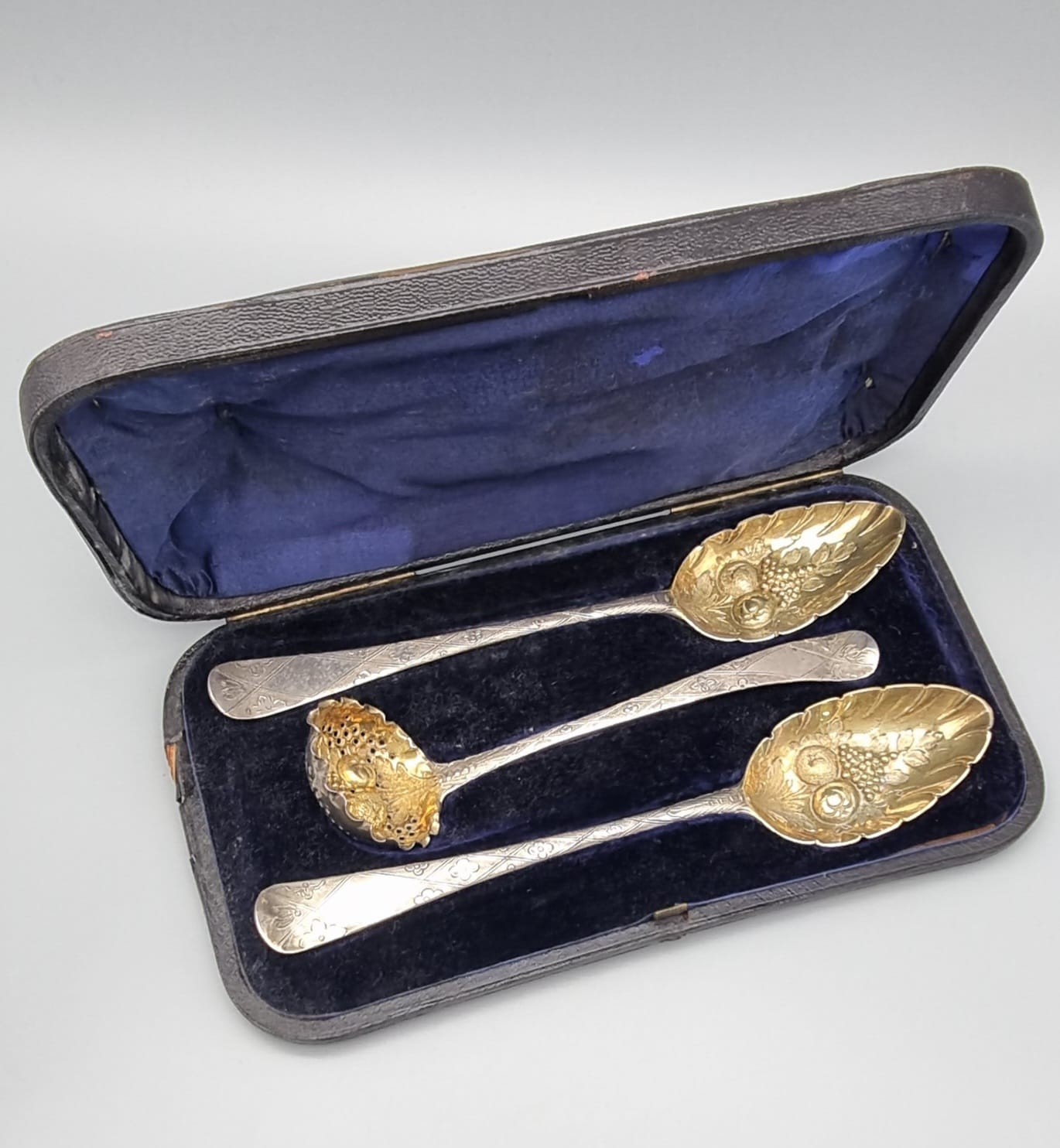 An Antique Georgian Solid Silver Gilt Set of Two Berry Spoons and a Berry Serving Ladle. In very