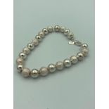 SILVER boule bracelet having smooth and frosted silver spheres with tag showing 925 silver. 8? (20