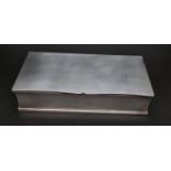 A Copper Silver Plated Cigarette Box. Wood interior. 10 x 20cm.