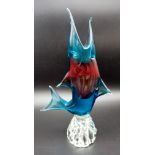 A Murano Blue and Purple Glass Sailfish Figure. 34cm tall. Good condition but A/F.