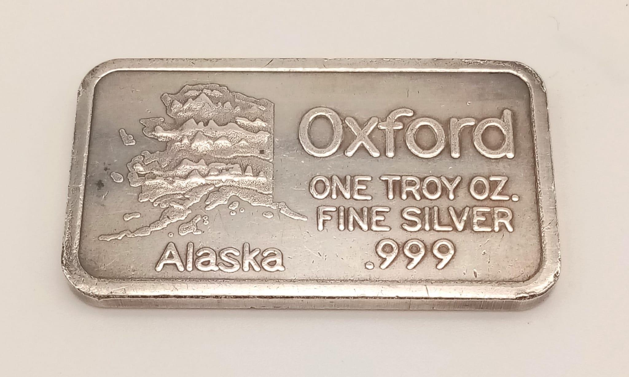 An Oxford Alaska Silver 1oz Bar - .999 silver. 31.4g 4.5 x 2.5cm.