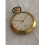Vintage INGERSOLL pocket watch in gold tone, manual top winding, full working order.