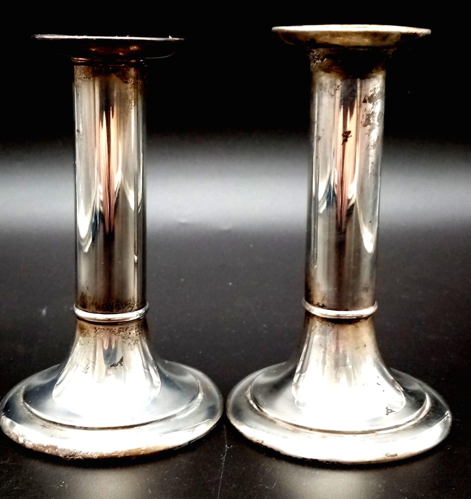 A Pair Of Vintage 925 Silver Small Tiffany and Co Candlesticks. Issue numbers - 16752 - 9575. 13cm