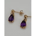 Pair of 9ct gold & pear shaped amethyst earrings