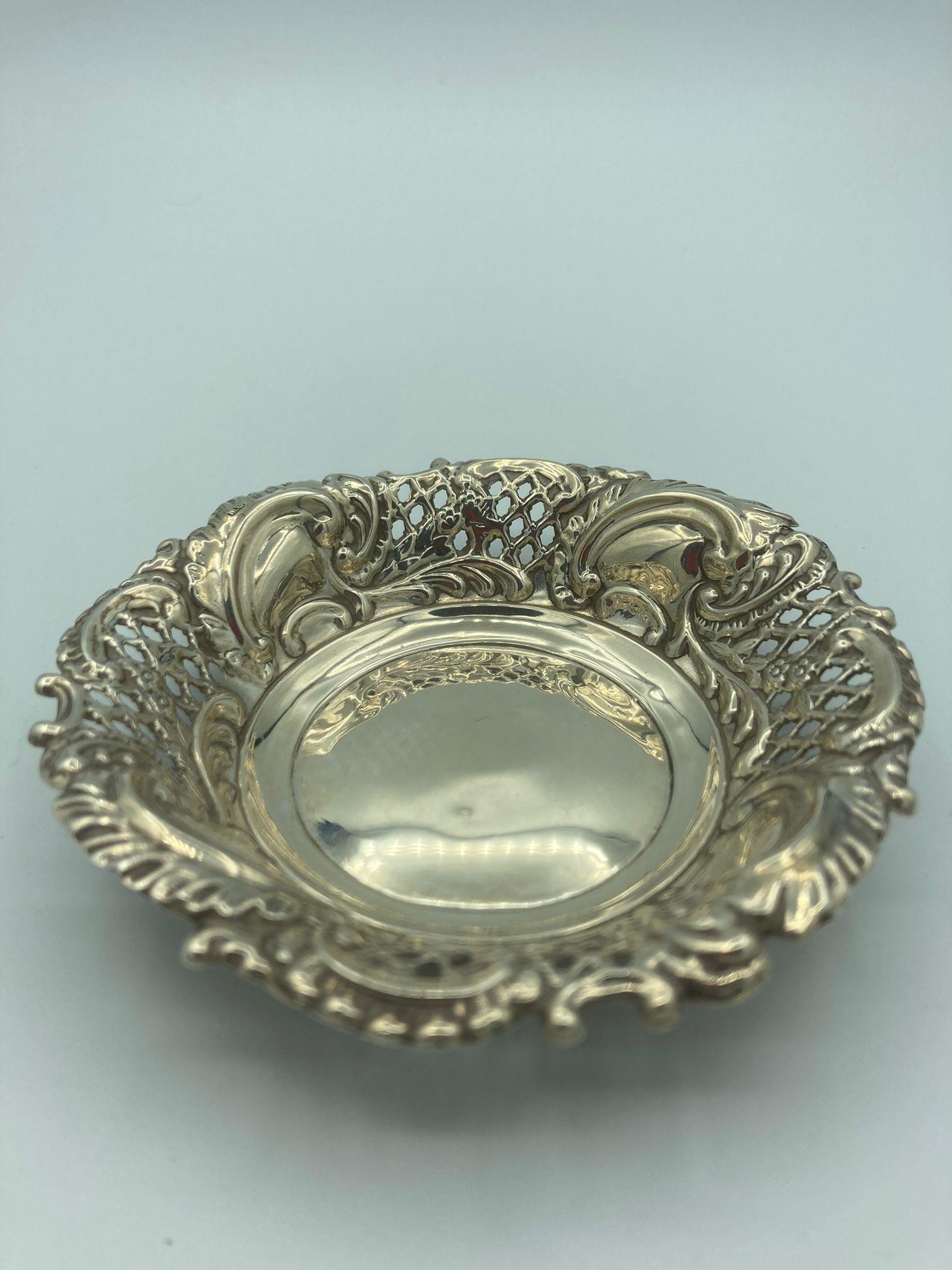 Antique silver bonbon dish having intricate filigree work to sides with clear Hallmark for Morris