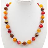 An Incredible Autumn Fire Agate Beaded Necklace with a Sterling Silver Clasp. 12mm vibrant