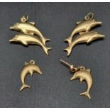 A pair of single dolphins and a pair of double dolphins that can be used as earrings of pendants.