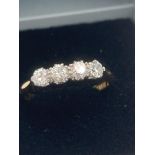 Beautiful 18 carat GOLD and DIAMOND ring having FOUR quality diamonds mounted in PLATINUM. 0.6