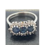 18 carat GOLD SAPPHIRE and DIAMOND trilogy RING. Having three large sapphires ( 1 carat )with full