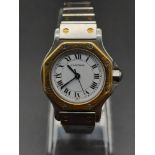 A Cartier Santos Ronde Stainless Steel and 18K Yellow Gold Ladies Watch. Case - 25mm. White dial.