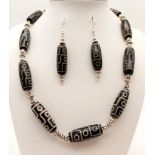 A traditional, Tibetan, nine eyed, Dzi beaded necklace and matching earrings set. Necklace length: