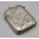 An Antique Silver Vesta Case. Hallmarks for Birmingham 1903. Hinge works. Chain attachment. 21.