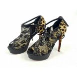 A Pair of Christian Louboutin Black/Brown Leopard Pony Hair and Lace Bridget Peep Toe Ankle Booties.