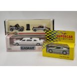 a collection of 4 die cast model cars to include a Ford stretch Limo, 2 rolls royces and an Aston