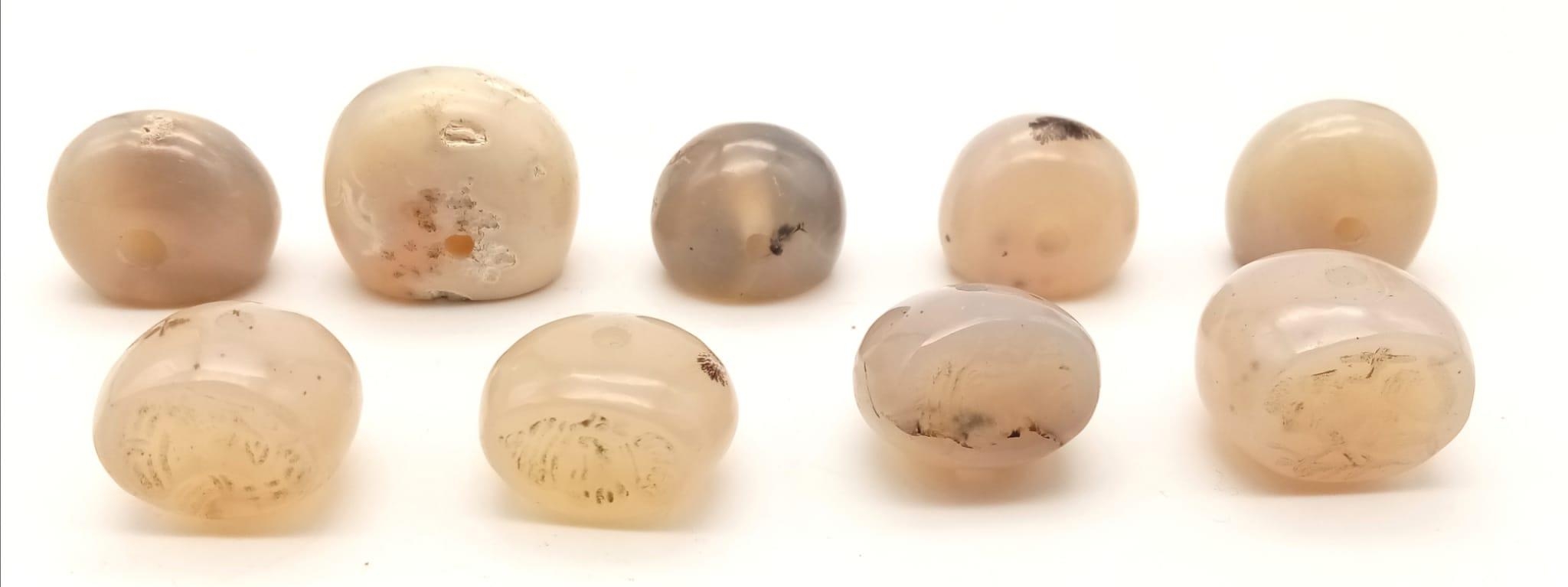 Nine Antique Islamic Roman Carved Agate Seals. 145g total weight.