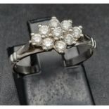 18k white gold diamond cluster ring, 0.40ct of diamonds, ring size N, total weight 2.9 grams