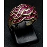 10K yellow gold ruby set twist ring, size N, total weight 4.9 grams