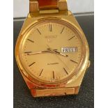 Vintage Gentlemans automatic SEIKO 5 wristwatch, rare day - date model in gold tone having