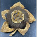 Vintage gold toned flower brooch with mink fur to centre. 6cm in length