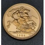 A proof 1985 sovereign. Struck in 22 k yellow gold, measures 22.5 mm and weighs 7.98 g. In