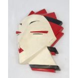 A Stylish Female Red, White and Black Art Deco Type Wall Mask. Couple of chips to hairline so A/F.