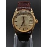 A Rare Rose-Gold Rolex Oyster Perpetual Unisex Watch. Brown leather strap. 18K Gold Case - 31mm.