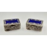 A nice pair of sterling silver and enamel pill boxes. Beautifully engraved, with no damages or