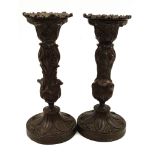 A Pair of Victorian Bronze Patinated Candlesticks. Removable capitals. 17cm tall.