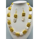 A highly unusual necklace with rectangular genuine, large pearls (20 x 15 mm) and 18 K yellow gold