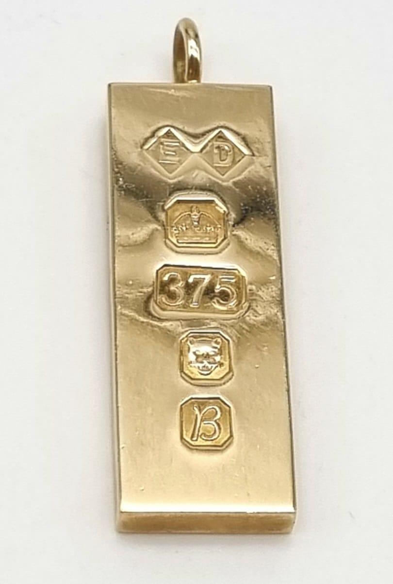 A 9k Gold Ingot Pendant. Hallmarks for London. 32g. 42mm.