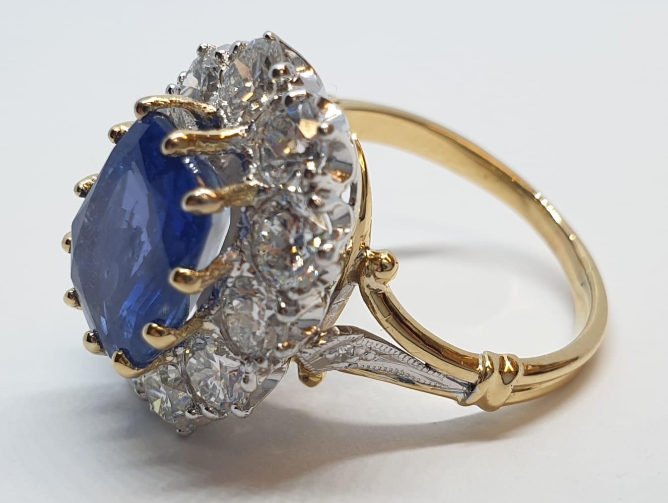 5.75ct sapphire ring set in white and yellow gold with over 3.5ct diamonds surrounding, weight 6. - Image 8 of 12