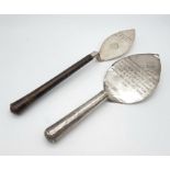 Two Antique Indian Silver Trowels. The first with a commemorative message regarding the first