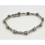 An Italian 14k White Gold, Diamond and Sapphire Tennis Bracelet. 16cm. 8g total weight.