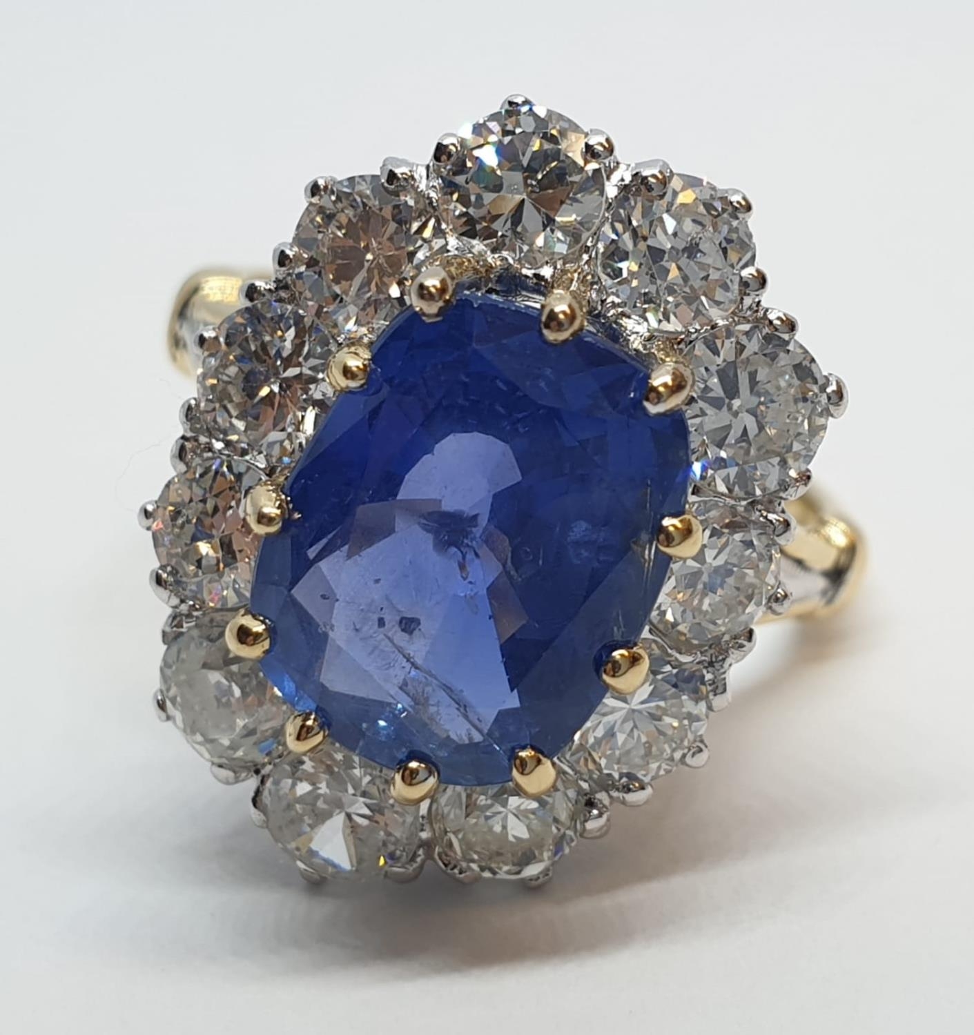 5.75ct sapphire ring set in white and yellow gold with over 3.5ct diamonds surrounding, weight 6. - Image 9 of 12