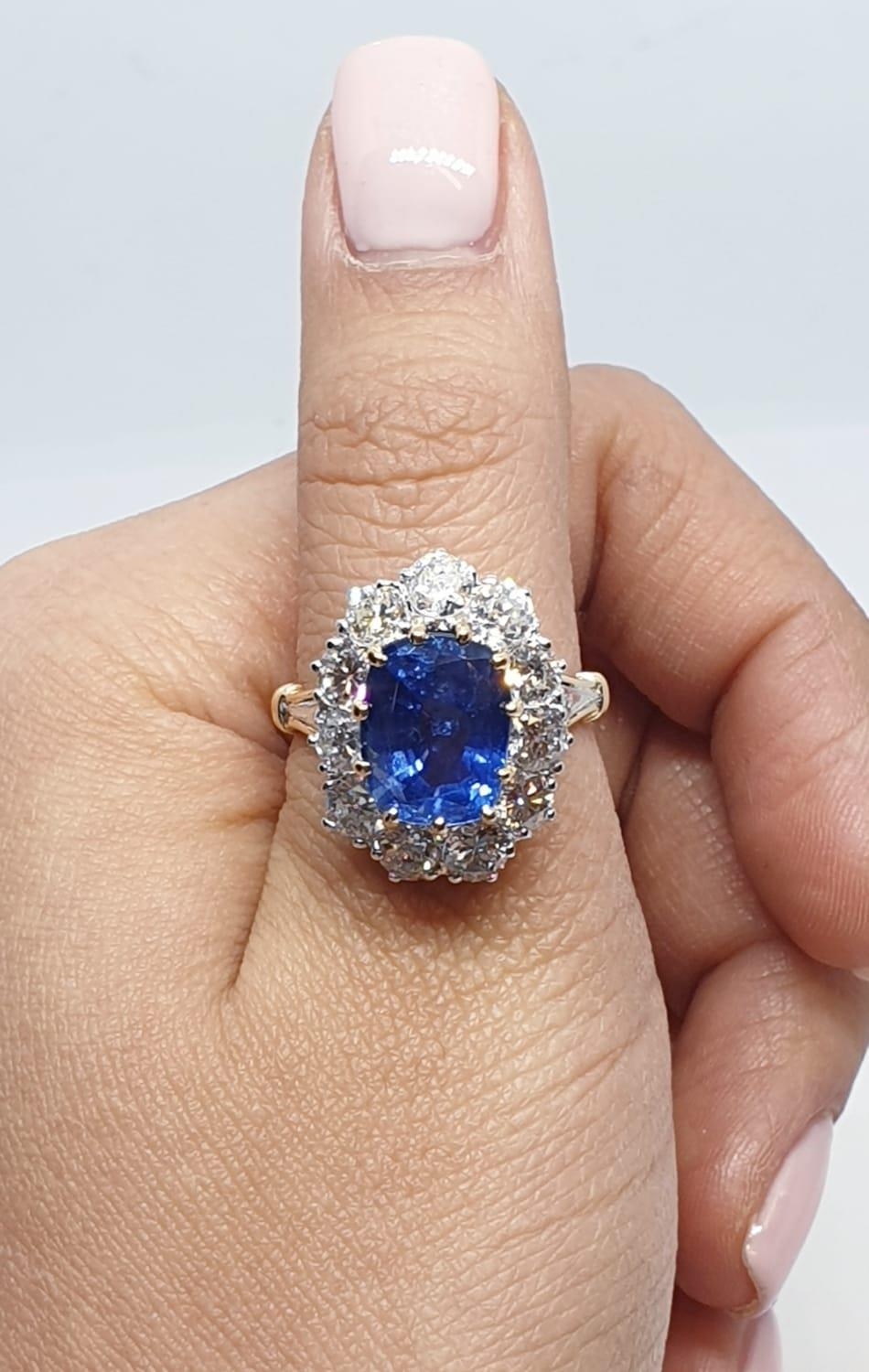 5.75ct sapphire ring set in white and yellow gold with over 3.5ct diamonds surrounding, weight 6. - Image 11 of 12