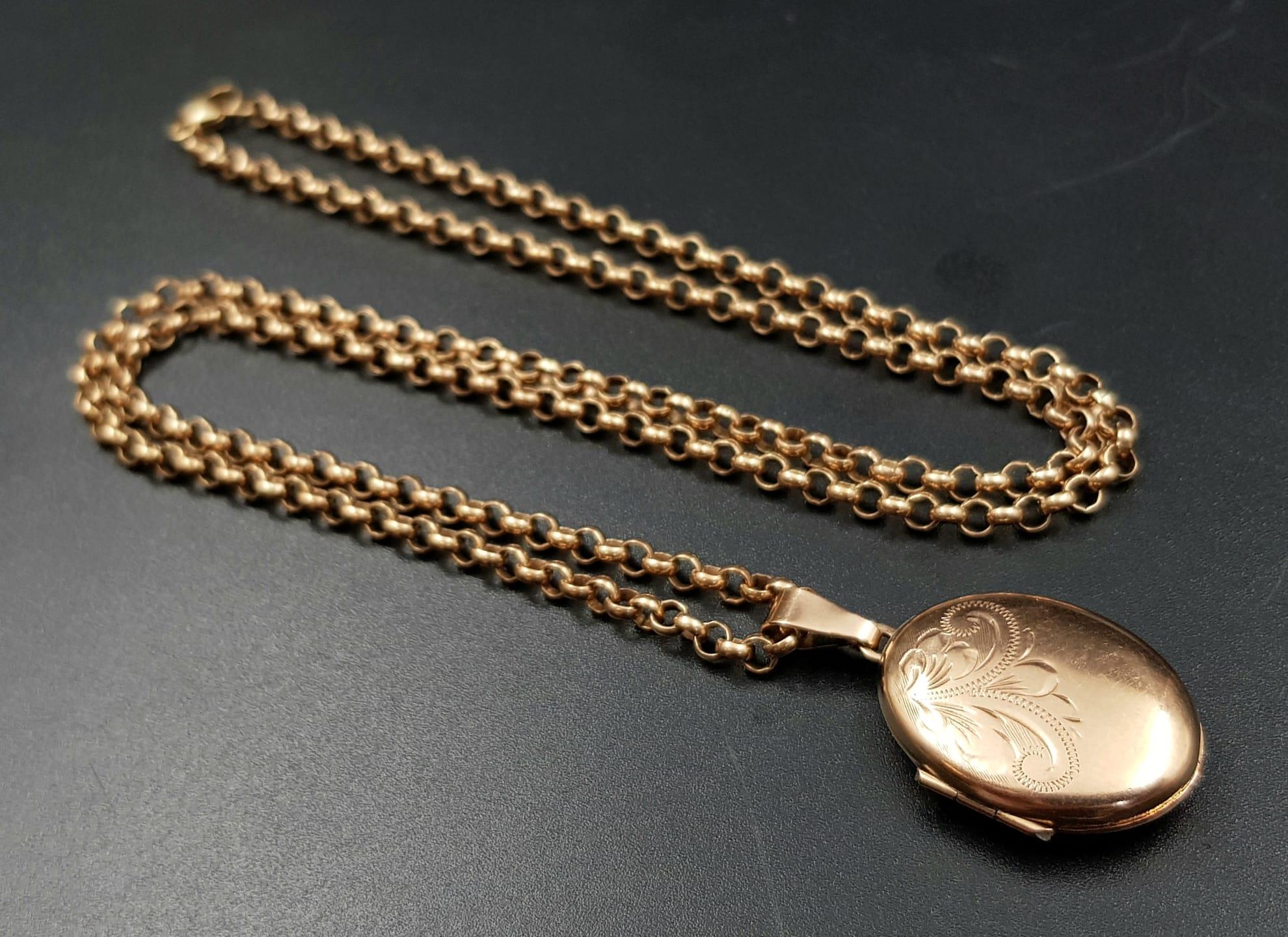 A VINTAGE 9K ROSE GOLD LOCKET ON A 60cms ROSE GOLD BELCHER CHAIN . 18.5gms