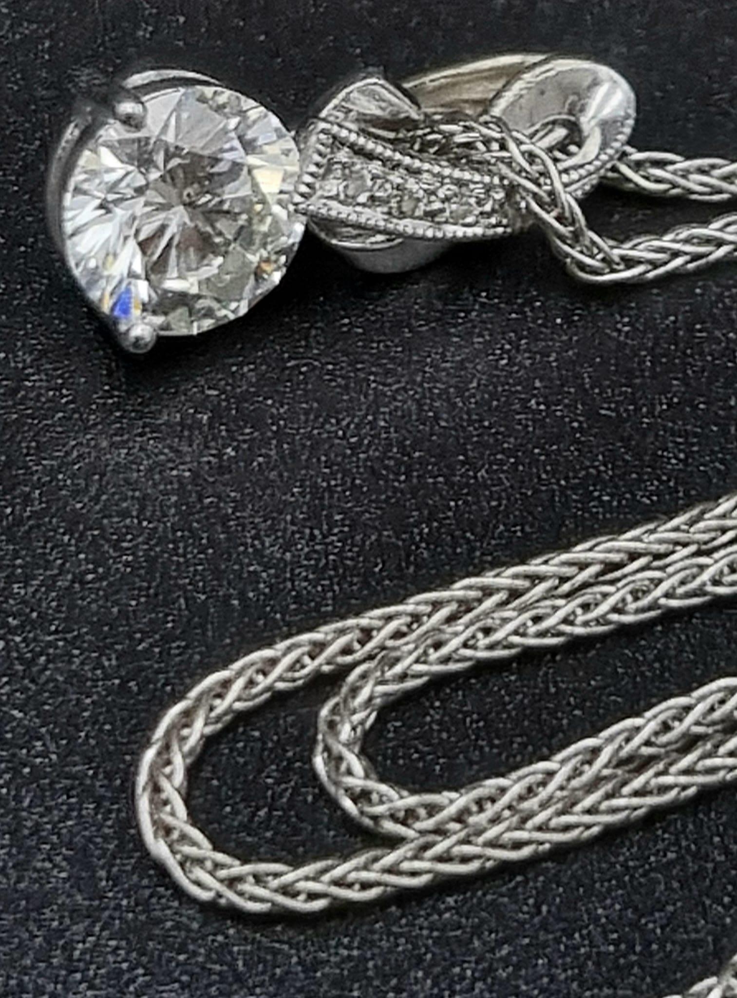 An 18k White Gold Diamond Pendant on a 14K White Gold Necklace. Round brilliant cut diamond - 0. - Image 3 of 7