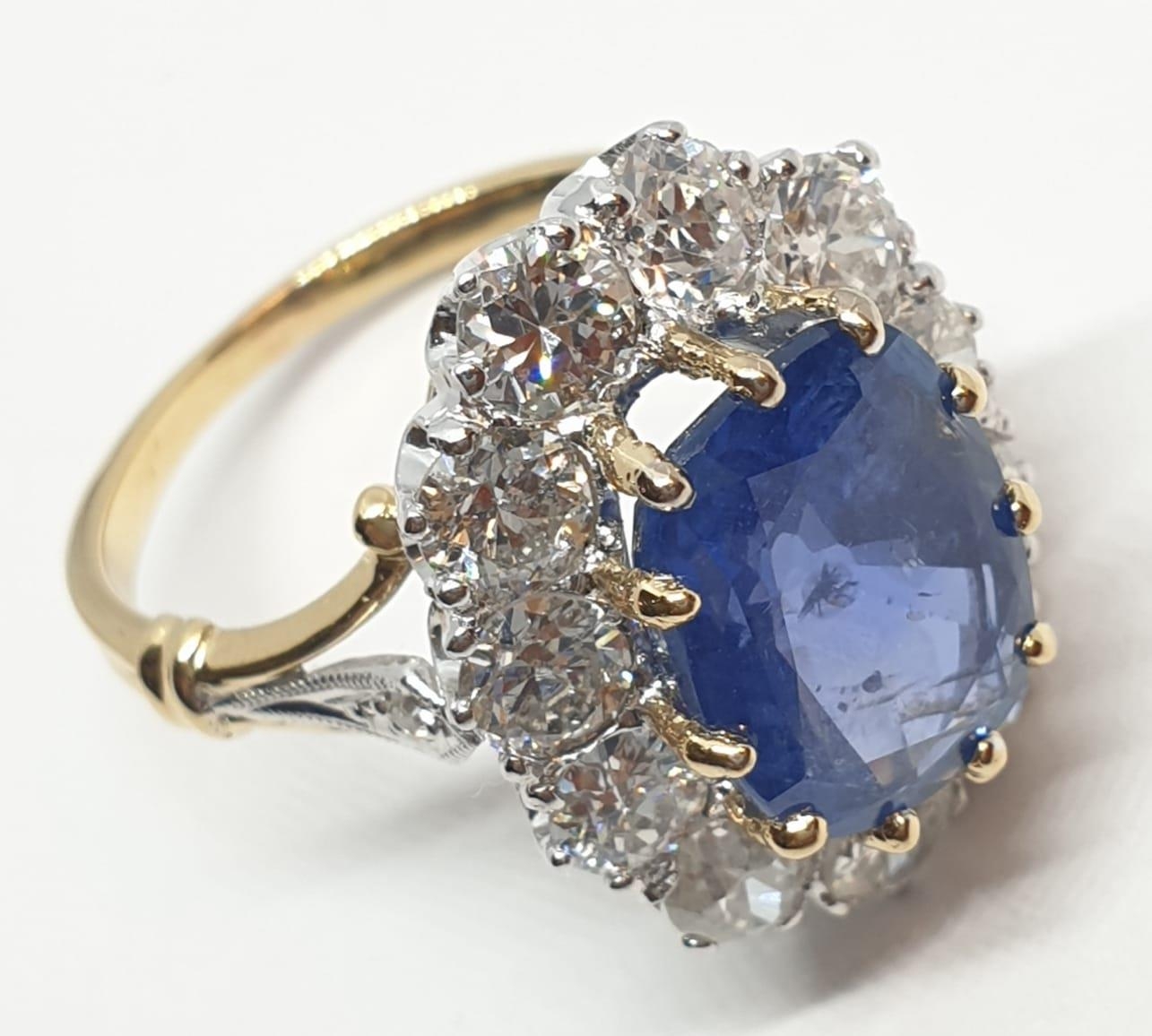 5.75ct sapphire ring set in white and yellow gold with over 3.5ct diamonds surrounding, weight 6. - Image 5 of 12