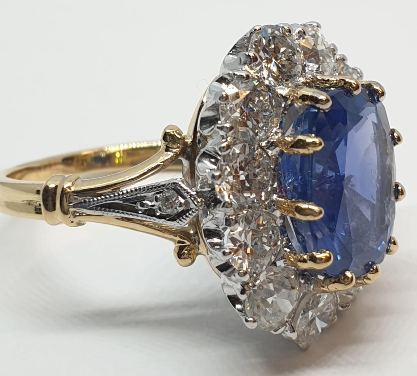 5.75ct sapphire ring set in white and yellow gold with over 3.5ct diamonds surrounding, weight 6. - Image 10 of 12