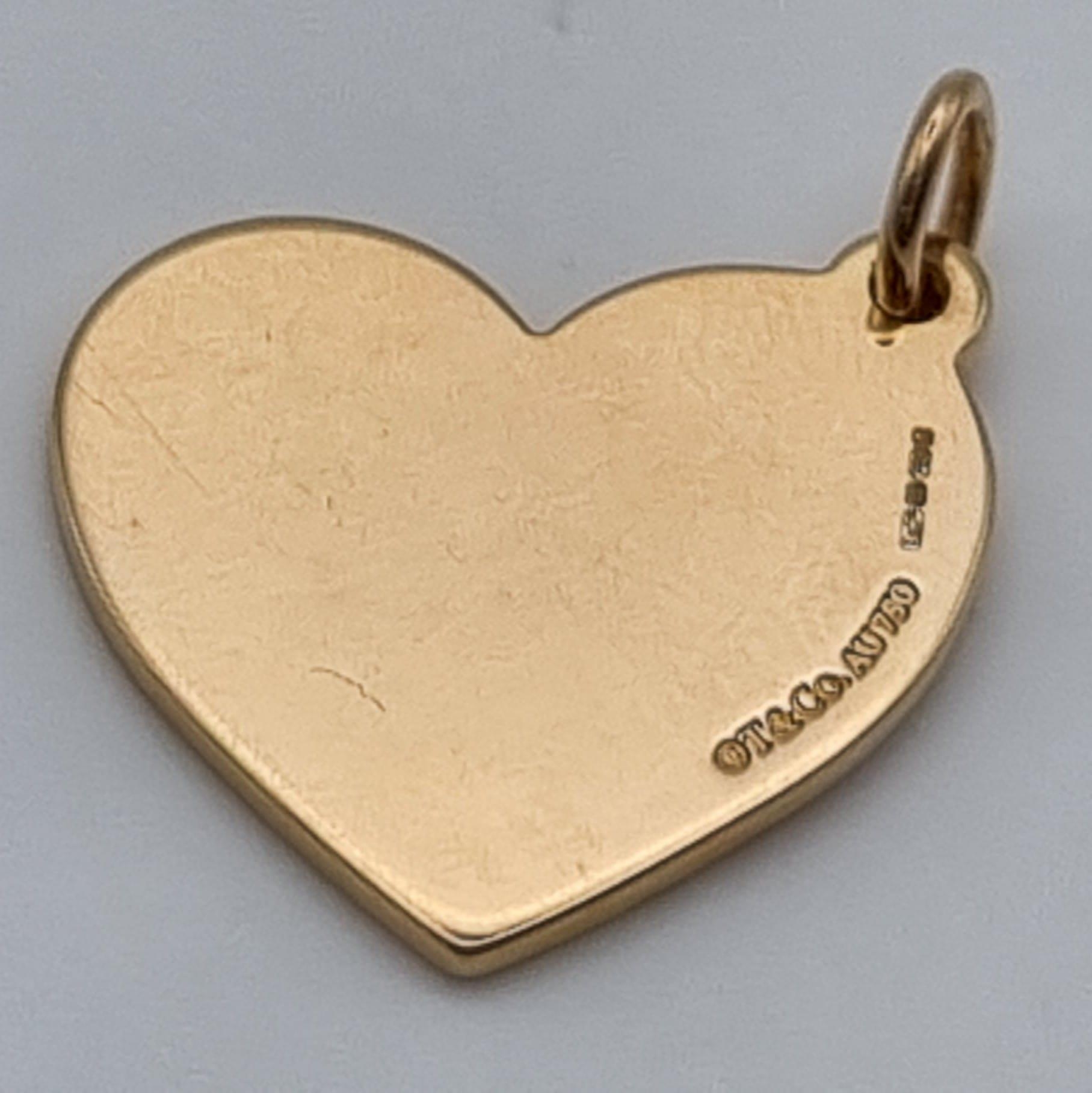 A TIFFANY 18K ROSE GOLD HEART PENDANT WITH ROSE ENGRAVING. 7.8gms - Image 2 of 3