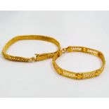 Two 22K Yellow Gold Bracelets - One snakeskin flat link - 18cm, the other, pierced geometric Roman