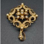 An Antique 15ct Yellow Gold and Seed Pearl Diamond Pendant or Brooch. Central diamond with a