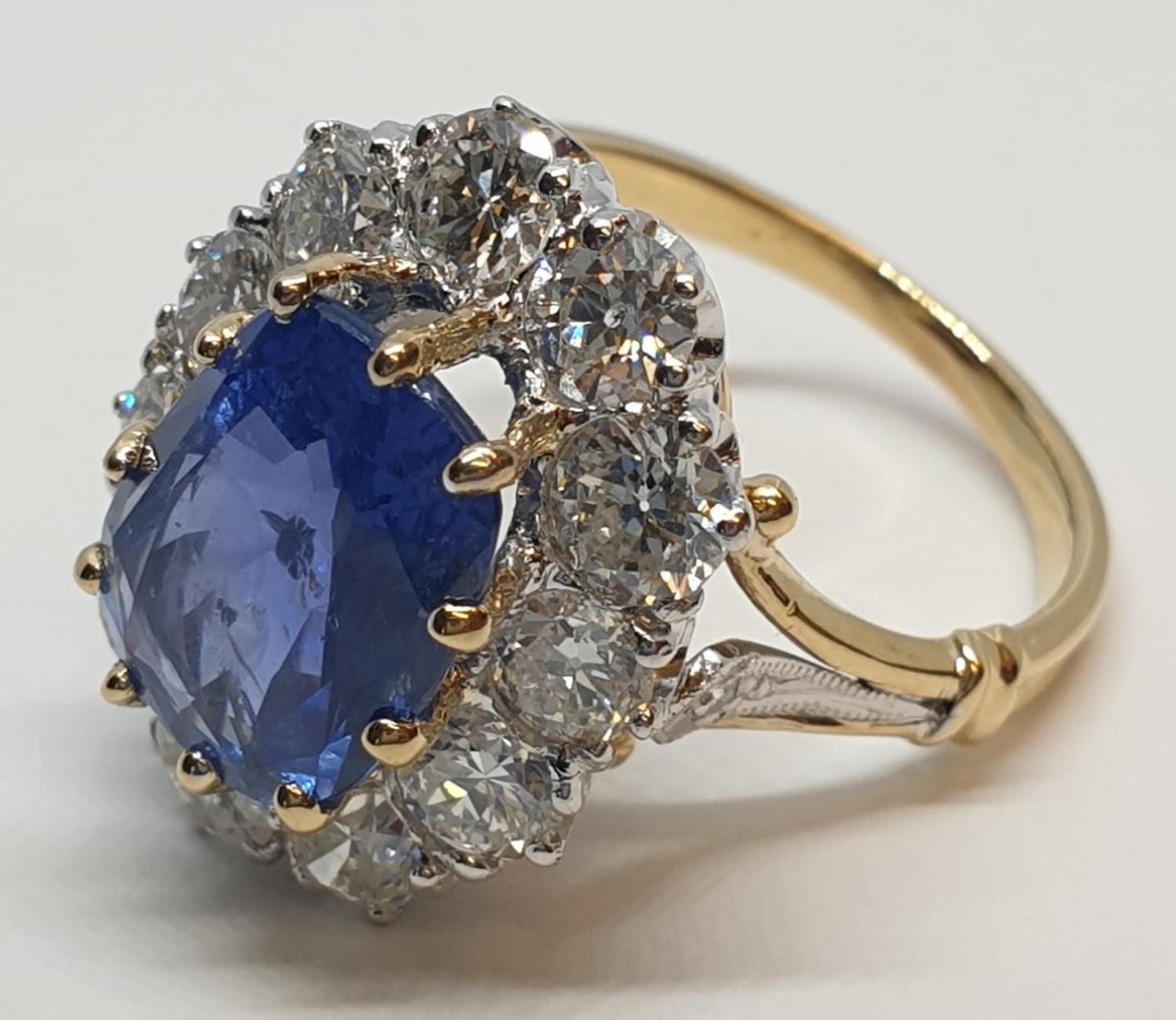 5.75ct sapphire ring set in white and yellow gold with over 3.5ct diamonds surrounding, weight 6. - Image 3 of 12