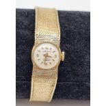 A Longine 9k Gold Ladies Dress Watch. 9K gold bracelet and case - 15mm. Quartz movement. Good