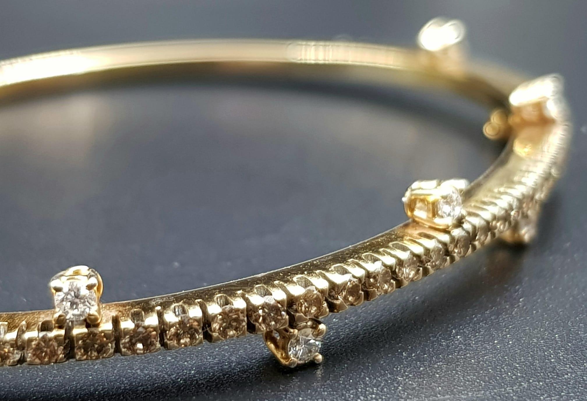 A VI NTAGE 18K ROSE GOLD AND DIAMOND BANGLE WITH BEAUTIFULLY DESIGNED DIAMONDS. 13.6gms - Image 3 of 7