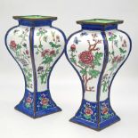 A Pair of 19th Century Chinese Cloisonné Enamel Vases. Floral decoration throughout. Rich green