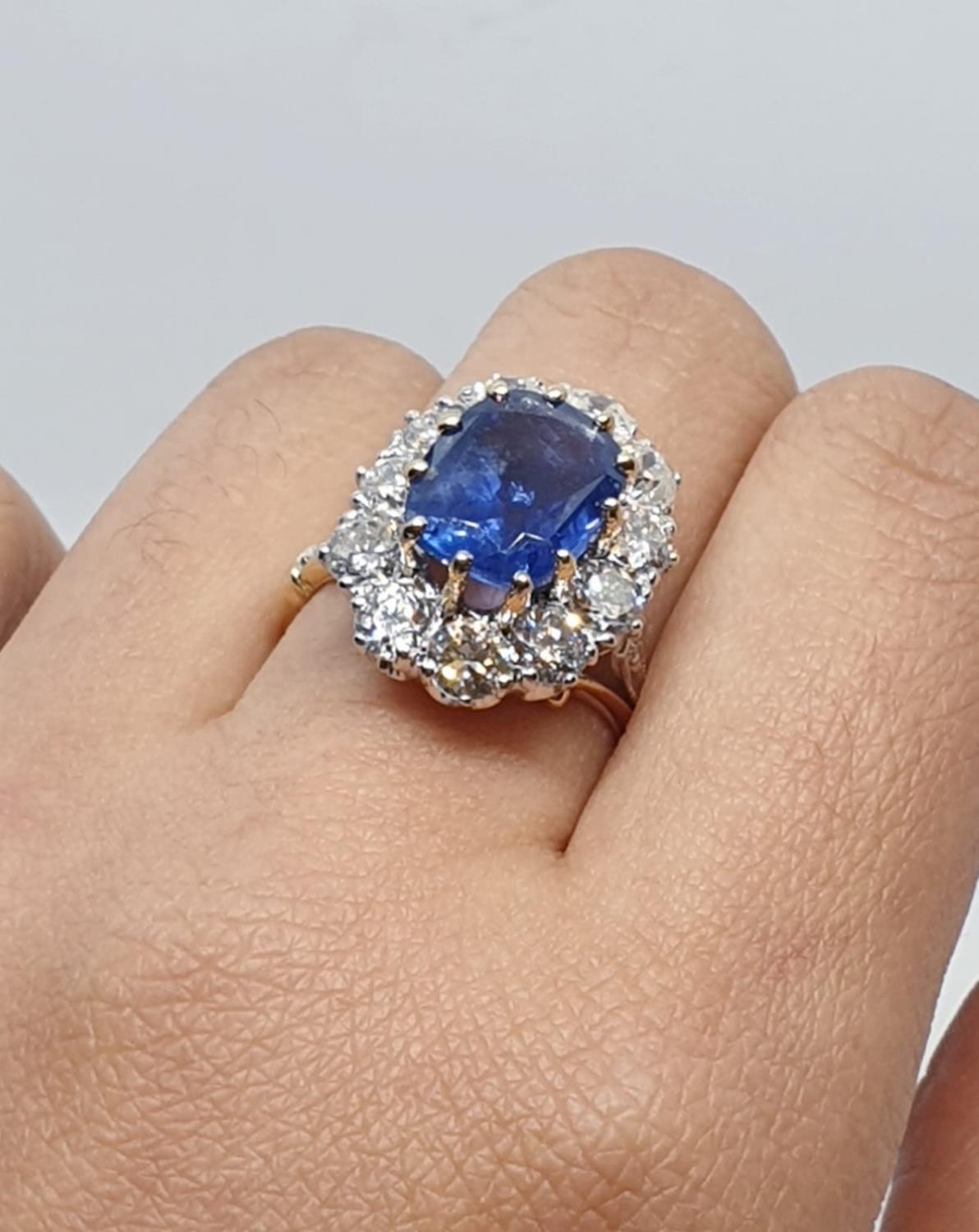 5.75ct sapphire ring set in white and yellow gold with over 3.5ct diamonds surrounding, weight 6. - Image 12 of 12